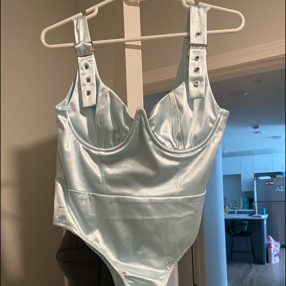 light blue bodysuit